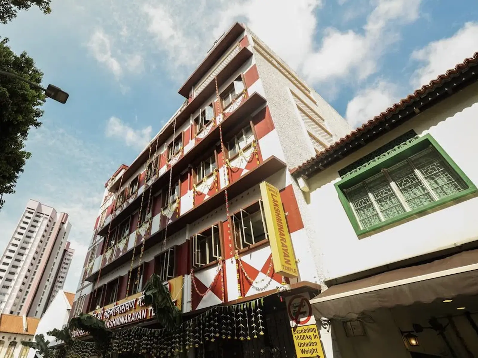 Heritage metal glass frame facade installed on association building along Chander Road