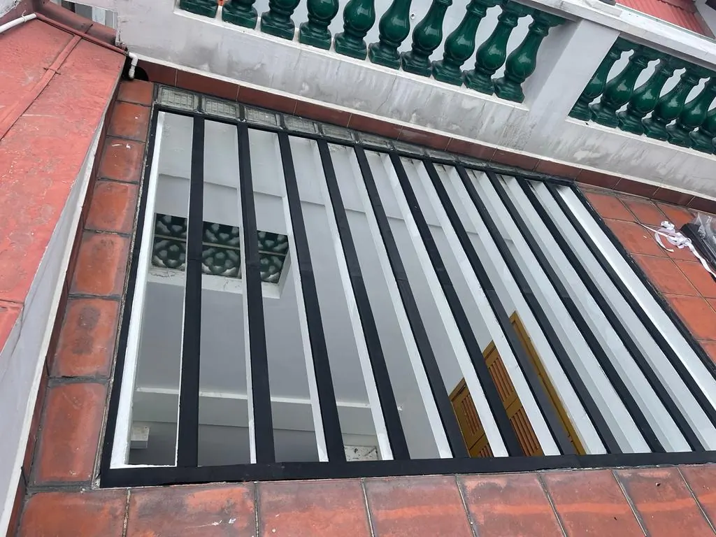 Glass panels covering airwell from interior courtyard view